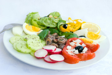 delicatessen anchovy mixed  - vegetable salad with boilrd eggs