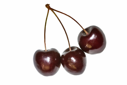 three sweet cherries