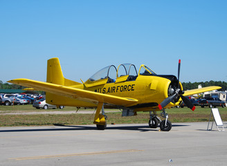 Fototapeta na wymiar Small yellow airplane