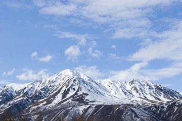Fototapeta na wymiar Snowy melting on mountains