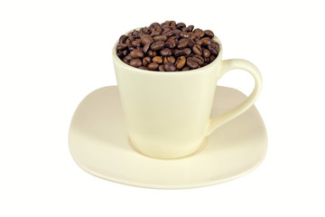 Coffee beans in cup