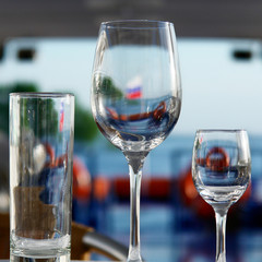 Wineglasses on the served table.        