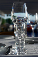 Wineglasses on the served table.        