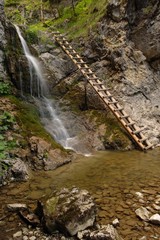 waterfall on mountains by name Rohace