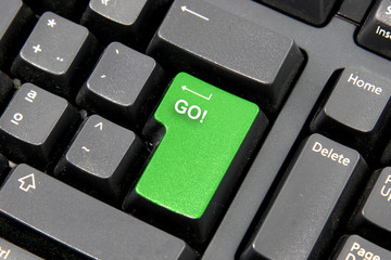 close up of a computer keyboard with GO for enter