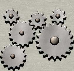 image of metal clockwork gears on metallic background