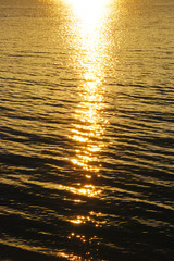 Golden water reflection background  