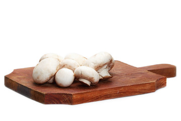 Close up of button mushrooms isolated on white background