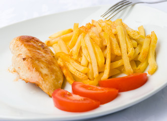 baked chicken breast  with french fried potatoes 2