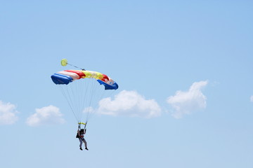 Parachuter and clouds