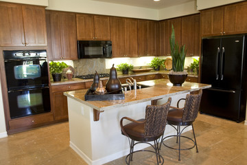 Kitchen with island and chairs
