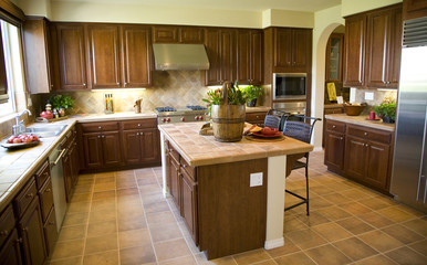 Kitchen with island and tiles