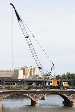 Crane working on a bridge
