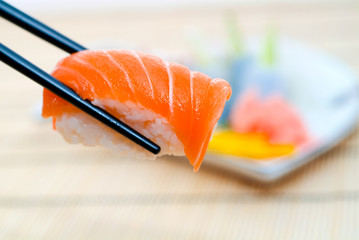 Sushi with chopsticks