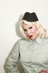 Woman in uniform with red lipstick