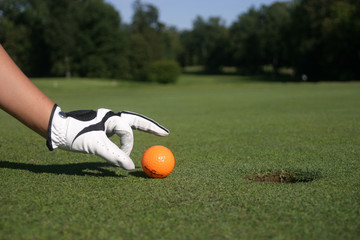 main de golfeur