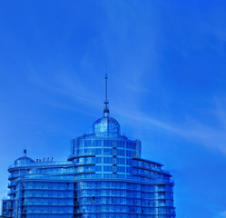 Obraz premium Urban office building over blue sky