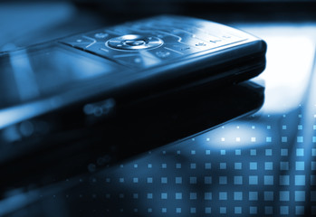 Blue toned picture of a mobile phone 