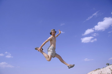 Obraz premium healthy happy man jumping in joy of life