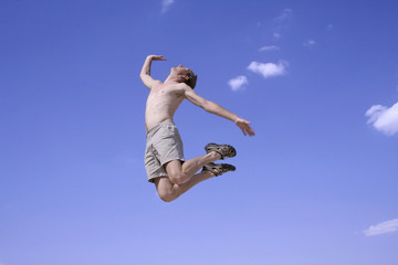 Obraz premium healthy happy man jumping in joy of life