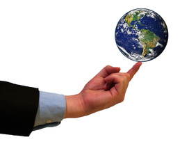 Businessman balancing  planet earth on his finger