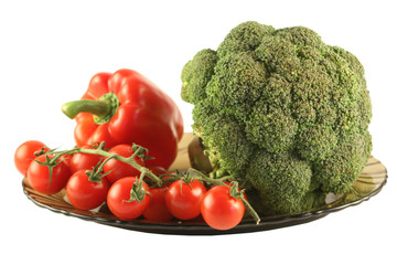Broccoli, pepper and tomatoes on a plate