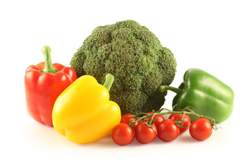 Broccoli, pepper and tomatoes on a white background