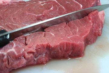 Juicy beef meat witth a knife