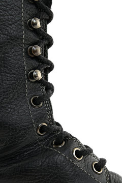 Closeup of black leather boot