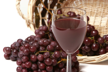 Red wine and grapes