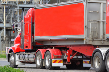 Red articulated semi truck