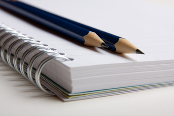 Spiral pad and pencils