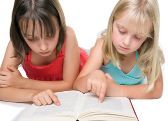 Fototapeta premium Two sisters reading