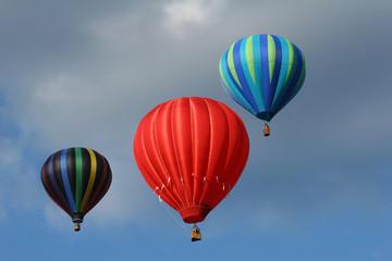 three hot air balloons