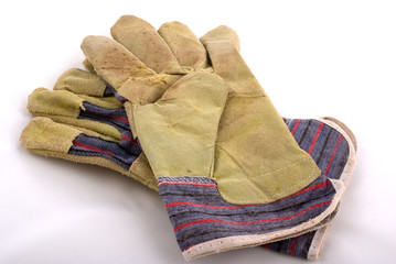leather working gloves on white background