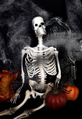 Skeleton With Pumpkins