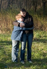 Family in autumn park.