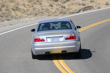 Fototapeta premium sports car taking sharp turn on the street