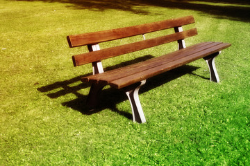Fototapeta premium Parkbank in Abendsonne