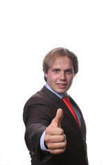 Young business man showing thumb up isolated