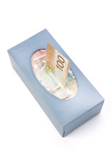 canadian dollars in a tissue box