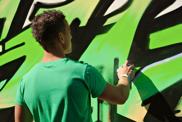 boy graffiti green painting
