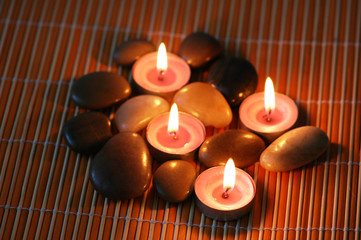 Aromatic candles and pebbles  for spa session