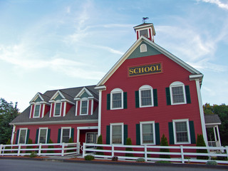 Colonial House School Building Against Blue Sky