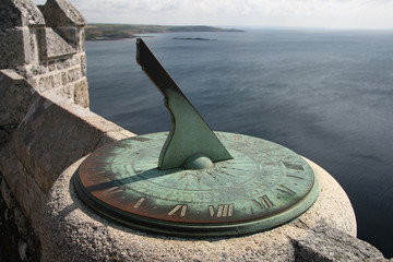 Ancient sundial on the castle walls of Saint Michael's Mount - obrazy, fototapety, plakaty