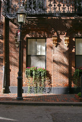 shuttered window with flowers