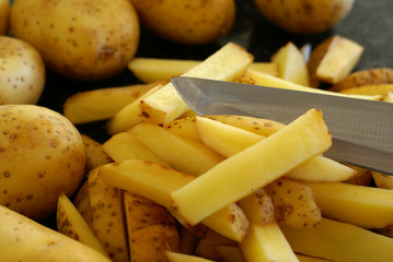 Raw potatoes prepared for frying chips