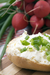 Bread roll with cheese on breakfast