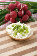 Bread roll with cheese on breakfast