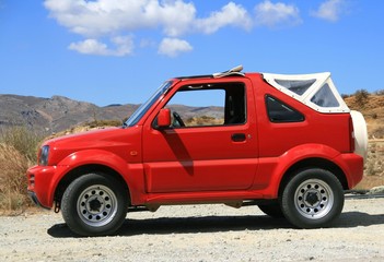Fototapeta na wymiar Red jeep